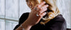 Loretana model hand stack of rhodium-plated 925 sterling silver rings, mirror-bright finish detail. Hand-finished hallmarked piece, Kaunas.
