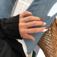 14K gold-plated essential stacking band ring in hallmarked 925 silver, ultra-slim 1mm width on white background, Loretana minimalist design.